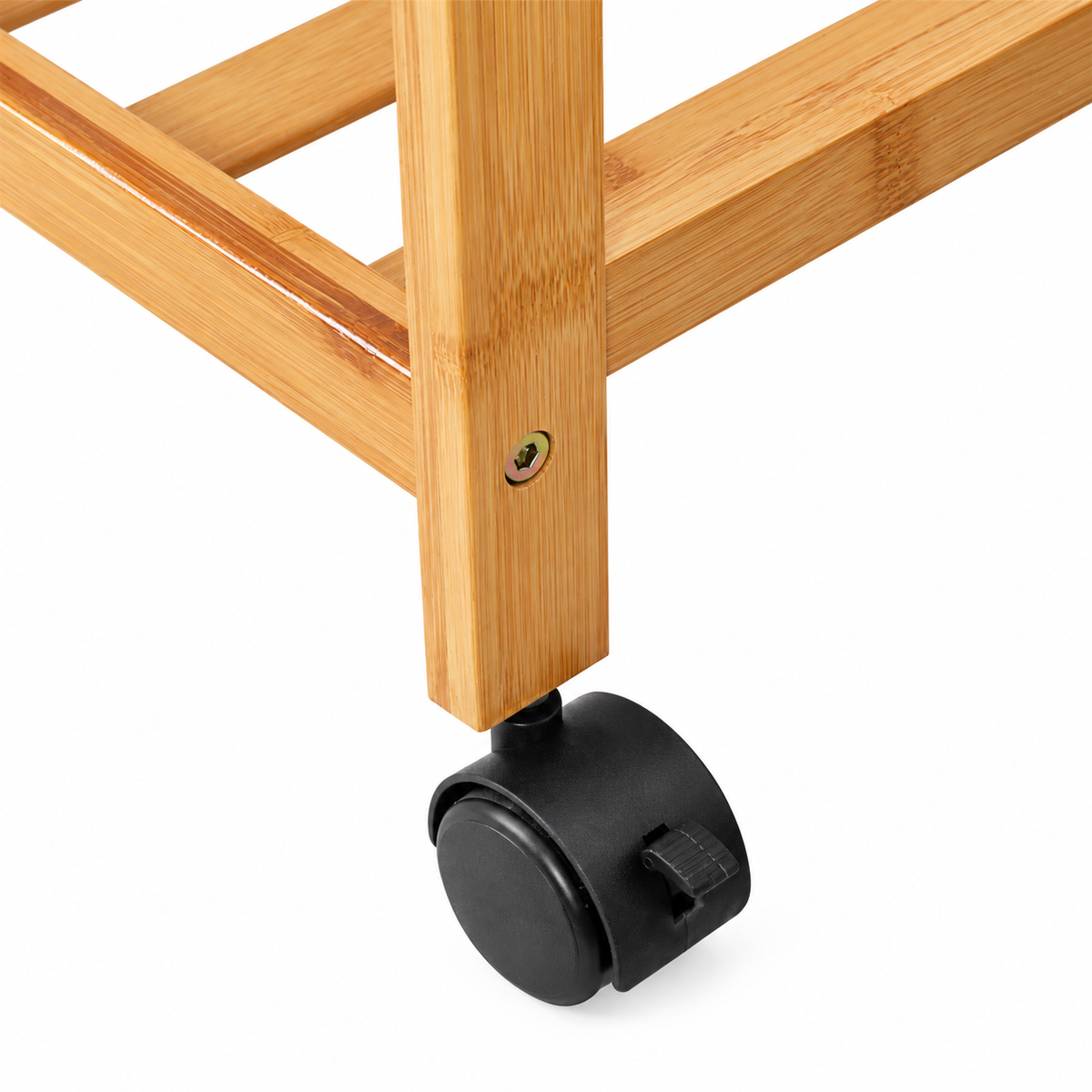 Close-up of a black caster wheel and screw joint on the bamboo clothes rack leg