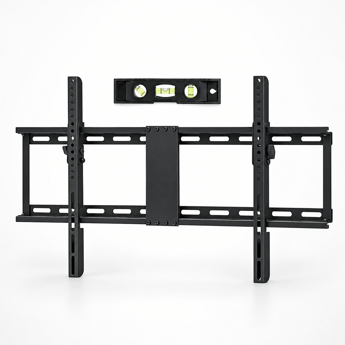 Black tilting TV wall mount bracket with a small level tool placed above it on a white background