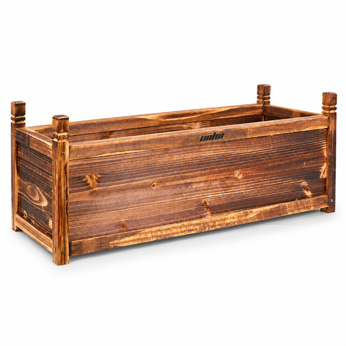 Empty long wooden planter box in carbonized pine showing four corner posts and screwed joints
